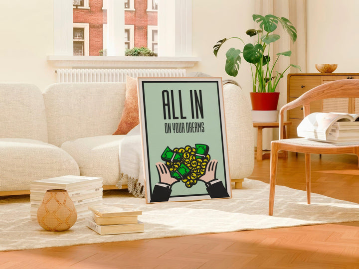 Mint green All In On Your Dreams poster in light wood frame leaning against a boucle sofa