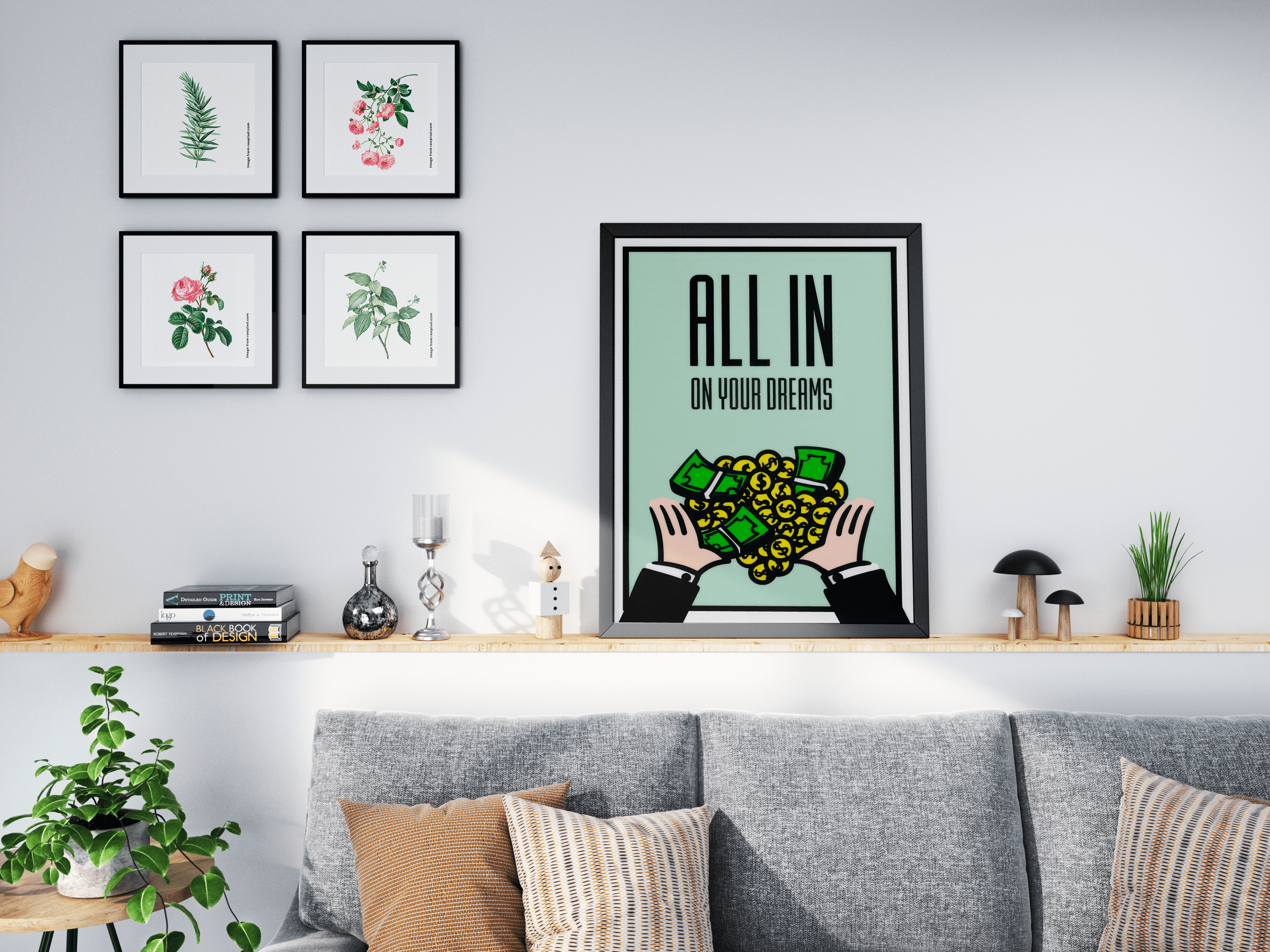 Black framed money print on a shelf above a grey sofa next to botanical gallery frames